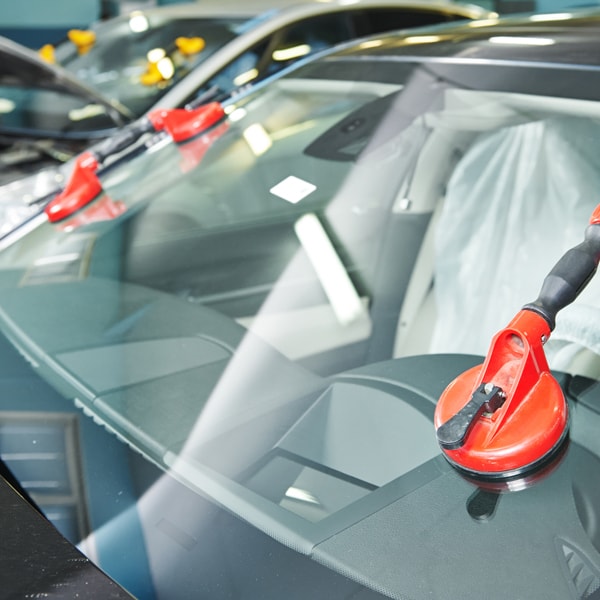 Which auto glass service to call when windshield is broken  in East Boston